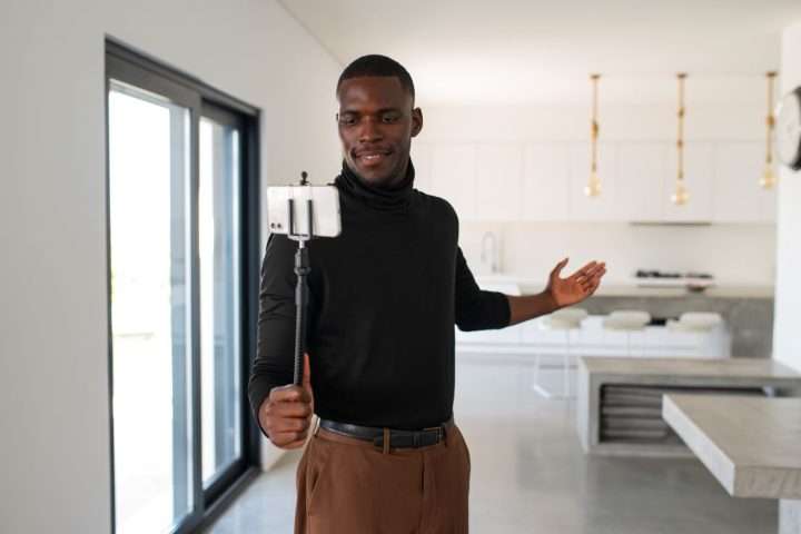 person-doing-house-tour-online